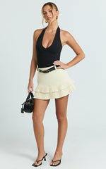 Felicia Mini Skirt - Mid Rise Drop Waist Pleated Skirt in Butter Yellow