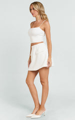 Karlene Mini Skirt - Tulip Shape Pocket Flap Skirt in White