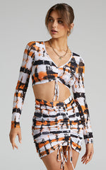 BY DYLN - Odette Mini Skirt in Orange Printed Mesh