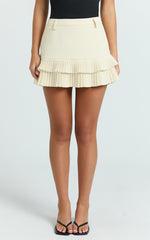 Felicia Mini Skirt - Mid Rise Drop Waist Pleated Skirt in Butter Yellow