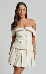 Maggie Mini Skirt - Pleated Mid Rise Boucle Skirt in Cream